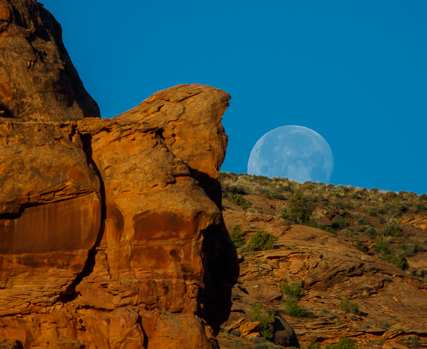 Full Moon Setting over Red Rocks in Moab, Utah