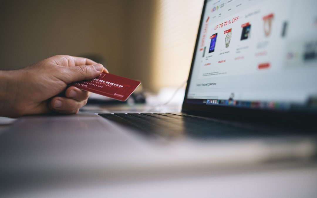 Consumer using credit card to purchase through eCommerce